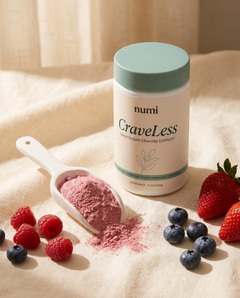 CraveLess teal bottle with berries and scoop